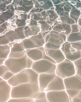 Close up of dry, flushed skin on the cheek after swimming in chlorinated pool